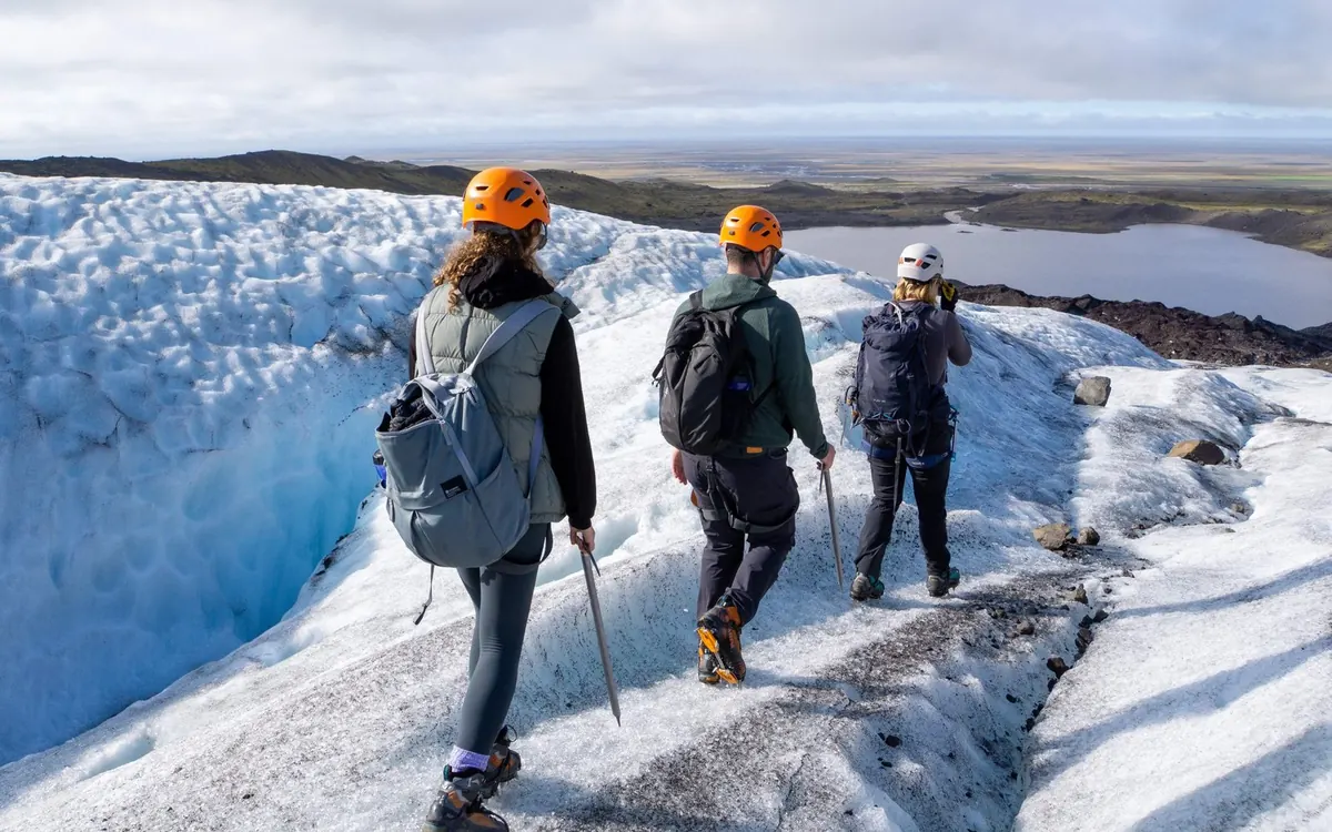 Hikers on a steep section of Falljokull glacier in Vatnajokull National Park