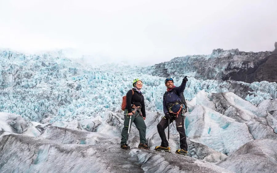 Hikers on a steep section of Falljokull glacier in Vatnajokull National Park